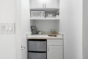 Fridge, microwave, coffee/tea maker, toaster