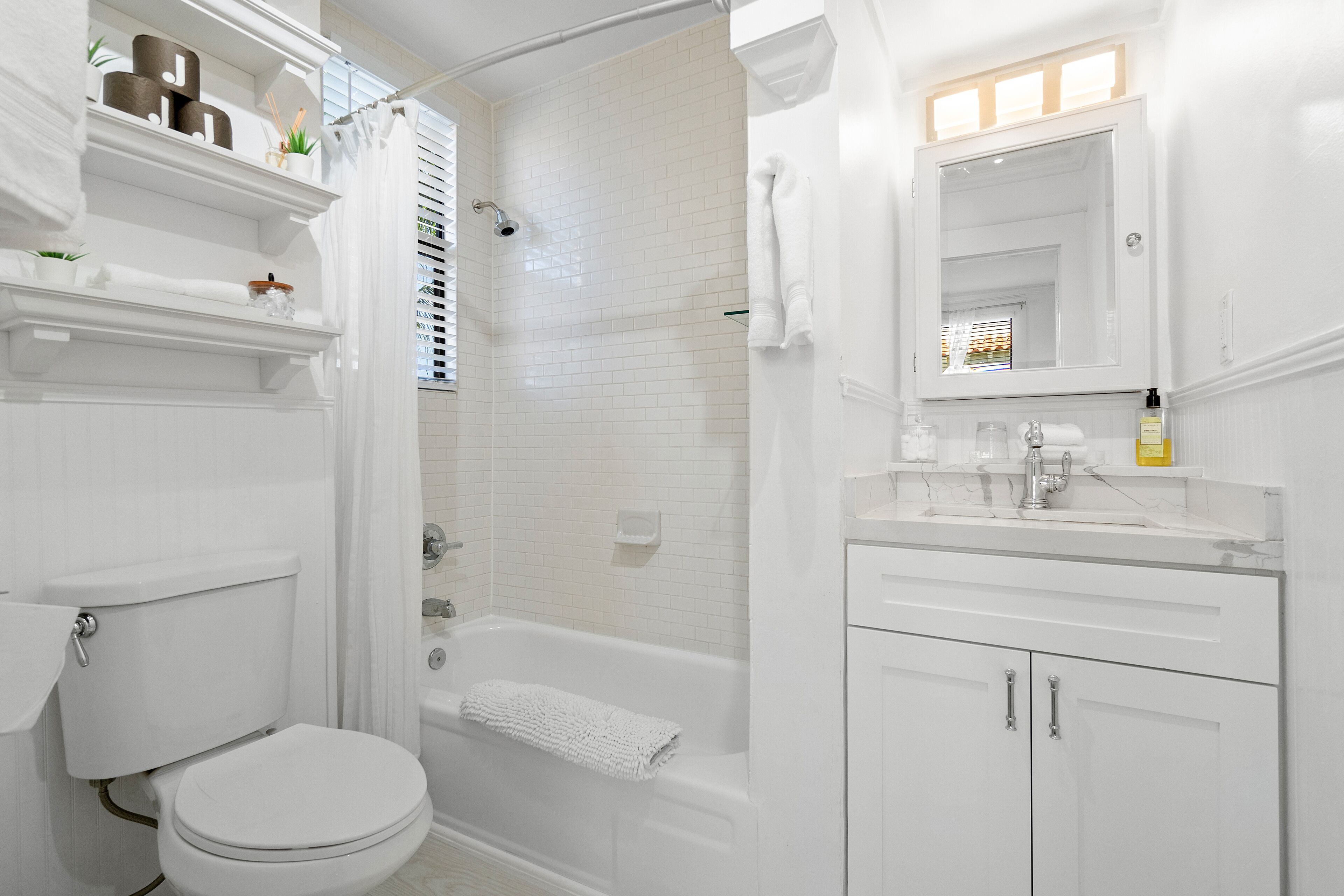 Hair dryer, towels, soap, shampoo
