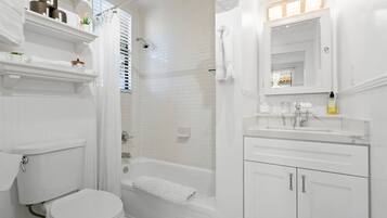 Hair dryer, towels, soap, shampoo