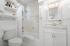 Hair dryer, towels, soap, shampoo