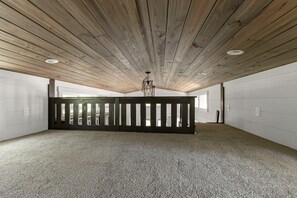 Interior - Park Model TinyHome with spacious front porch table outdoor furniture and spa. (Clubb)