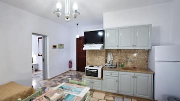 Réfrigérateur, four, plaque de cuisson, cafetiÚre/bouilloire