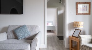 Fireplace, ping pong - Fishery Views - Keepers Cottage (Graythwaite)