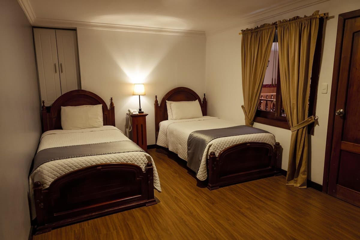Premium bedding, down comforters, desk, iron/ironing board (on request)