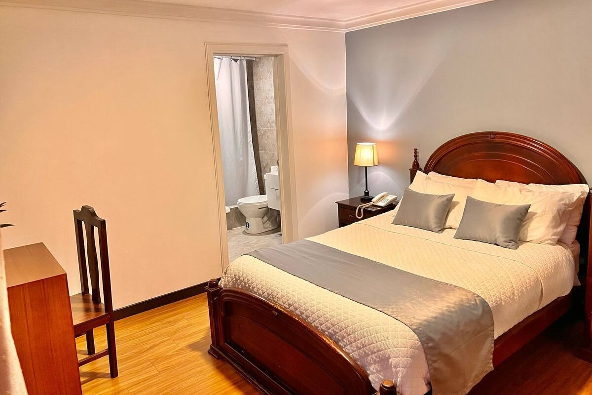 Premium bedding, down comforters, desk, iron/ironing board (on request)