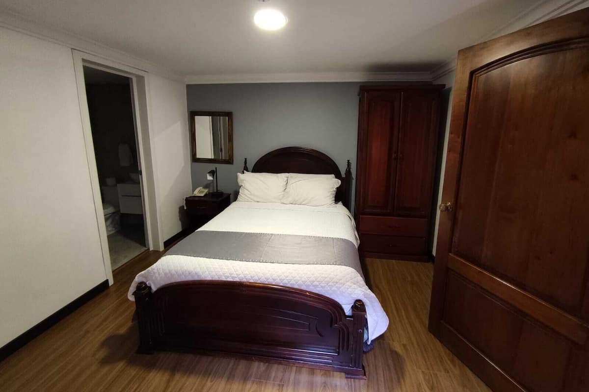 Premium bedding, down comforters, desk, iron/ironing board (on request)
