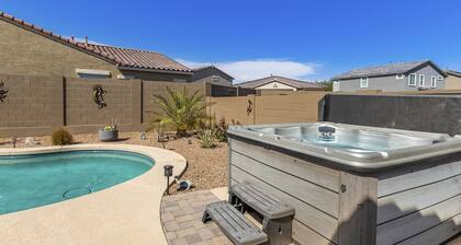 Airy desert home with an enclosed yard, private pool, hot tub, firepit, & W/D