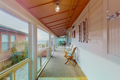 Oceanfront home with private hot tub, walls of glass & spectacular view