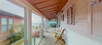 Oceanfront home with private hot tub, walls of glass & spectacular view