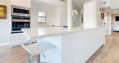 Dog-friendly waterfront retreat with a washer/dryer, furnished patio, & AC