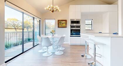 Dog-friendly waterfront retreat with a washer/dryer, furnished patio, & AC