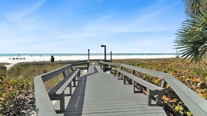 A wooden boardwalk leading to a beach with a clear sky. - Spacious 2BR Siesta Key condo with beach access - GBB 1241 (Siesta Key)