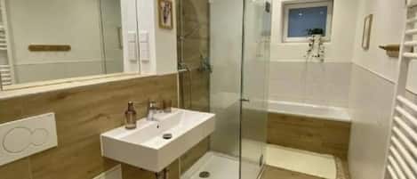 Shower, free toiletries, hair dryer, towels