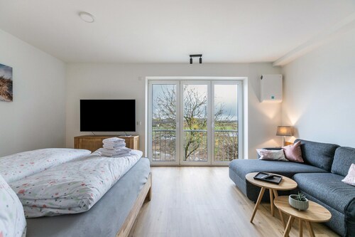 Ferienwohnung 'Husbyries 11' mit Gemeinschaftsgarten und WLAN