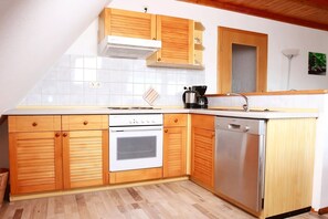 Réfrigérateur, four, plaque de cuisson, lave-vaisselle