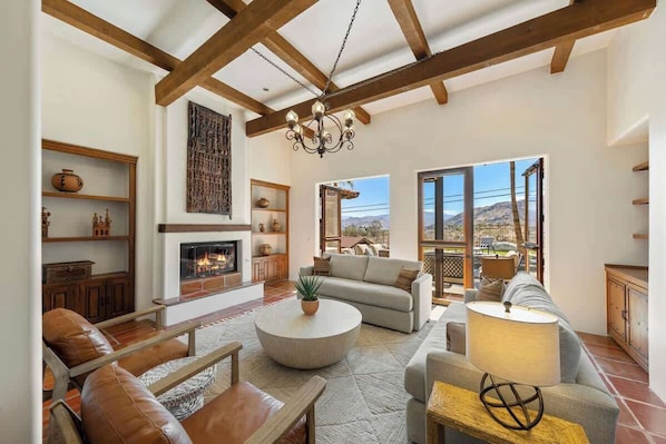 Smart TV, fireplace, books, printers