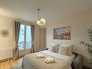 1 chambre, fer et planche à repasser, lit parapluie, Wi-Fi