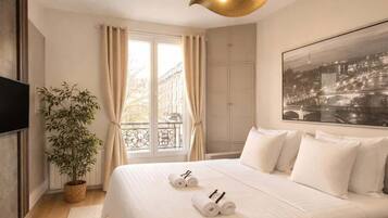 1 slaapkamer, een strijkplank/strijkijzer, reisbedje, wifi