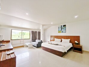 Classic Double Room | Living area | 43-inch LED TV with digital channels, Netflix, streaming services - V Beach Resort (Patong)