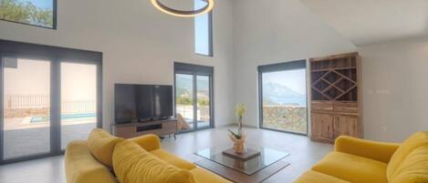 Premium Villa | Living area | 32-inch LCD TV with cable channels