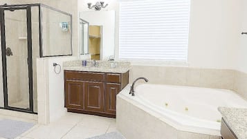 Shower, jetted tub, hair dryer, towels