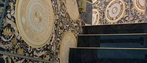 Deluxe Triple Room | Living area | 32-inch flat-screen TV with cable channels, books, pay movies