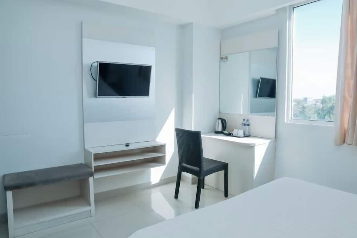 Desk, free WiFi, bed sheets