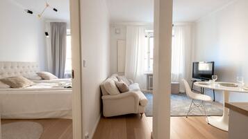 Apartamento conforto | Área de estar | TV de tela plana