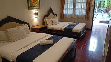 Family Room | 1 habitación, escritorio, wifi gratis y ropa de cama