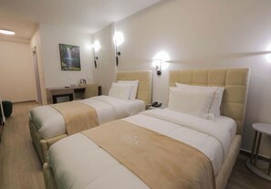 Standard Twin Room | Minibar, in-room safe, desk, laptop workspace - Olia Residence (Tirana)