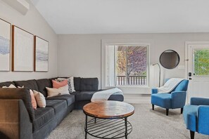 Smart TV, fireplace, table football, books