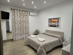 2 bedrooms, in-room safe, iron/ironing board, travel cot