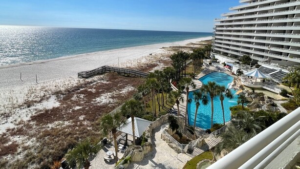 A resort with a pool, beach, and ocean view. - Gulf Front Condo with Stunning Views! (Pensacola)
