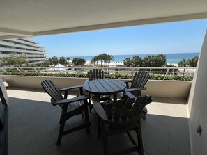 Outdoor dining - Gulf Front Condo with Stunning Views! (Pensacola)