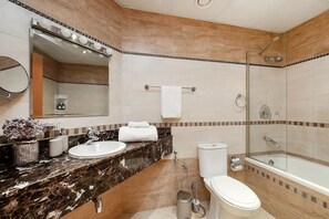 Eco-friendly toiletries, hair dryer, towels, toilet paper
