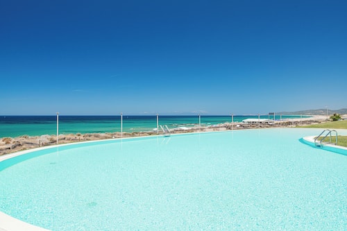 Seasonal outdoor pool, pool umbrellas, pool loungers