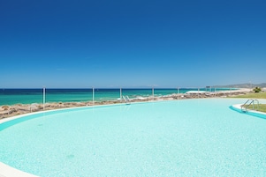 Seasonal outdoor pool, pool umbrellas, sun loungers