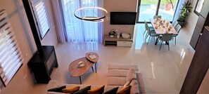 Panoramic Villa | Living area | Smart TV, fireplace