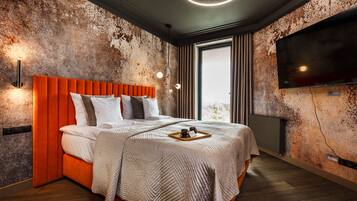 2 habitaciones, cortinas blackout y sistema de insonorización