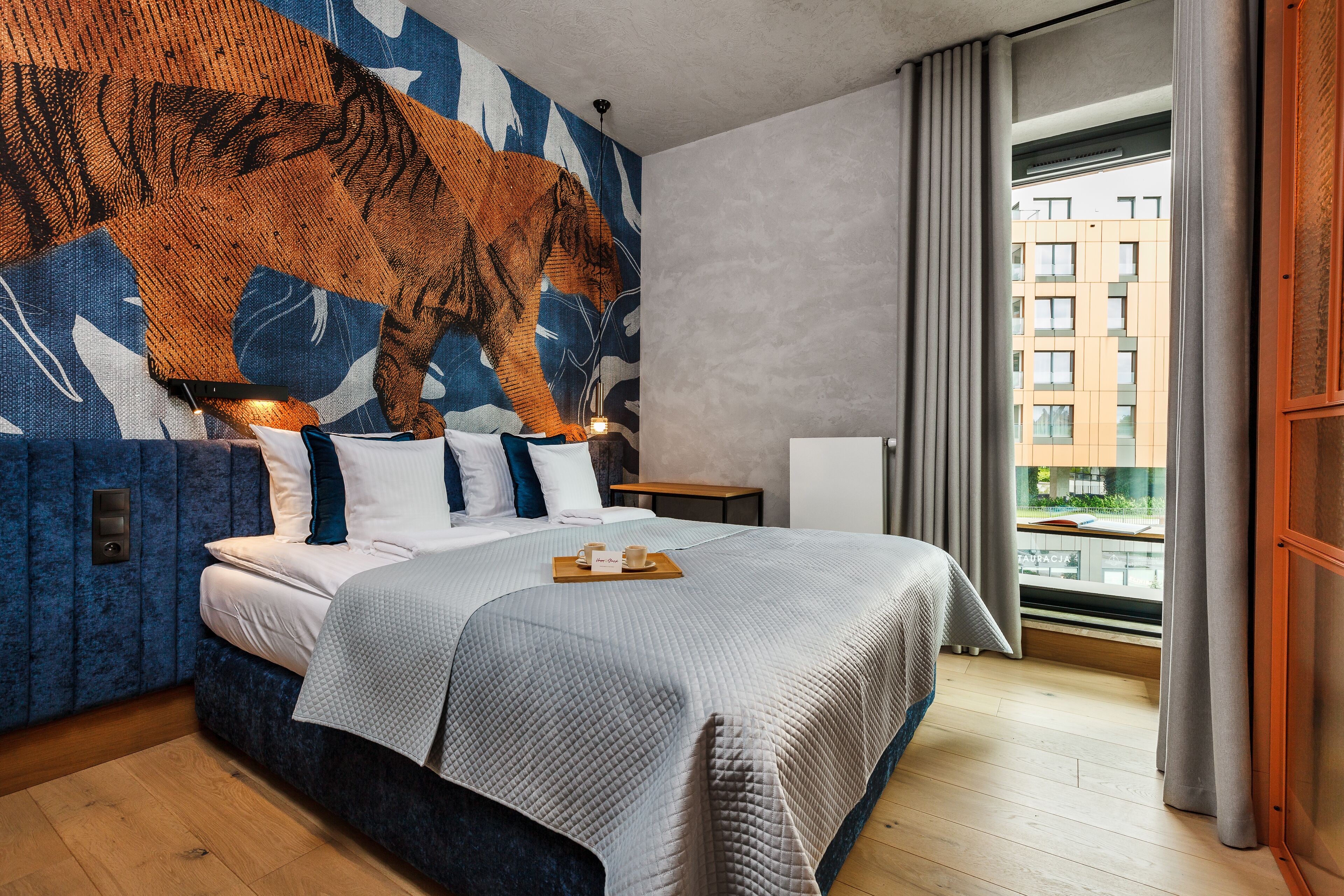 Premium Apartment, 1 Bedroom, Balcony, City View | Living area | 54-inch Smart TV with cable channels, stereo