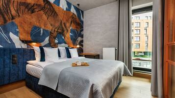 Premium Apartment, 1 Bedroom, Balcony, City View | Living area | 54-inch Smart TV with cable channels, stereo