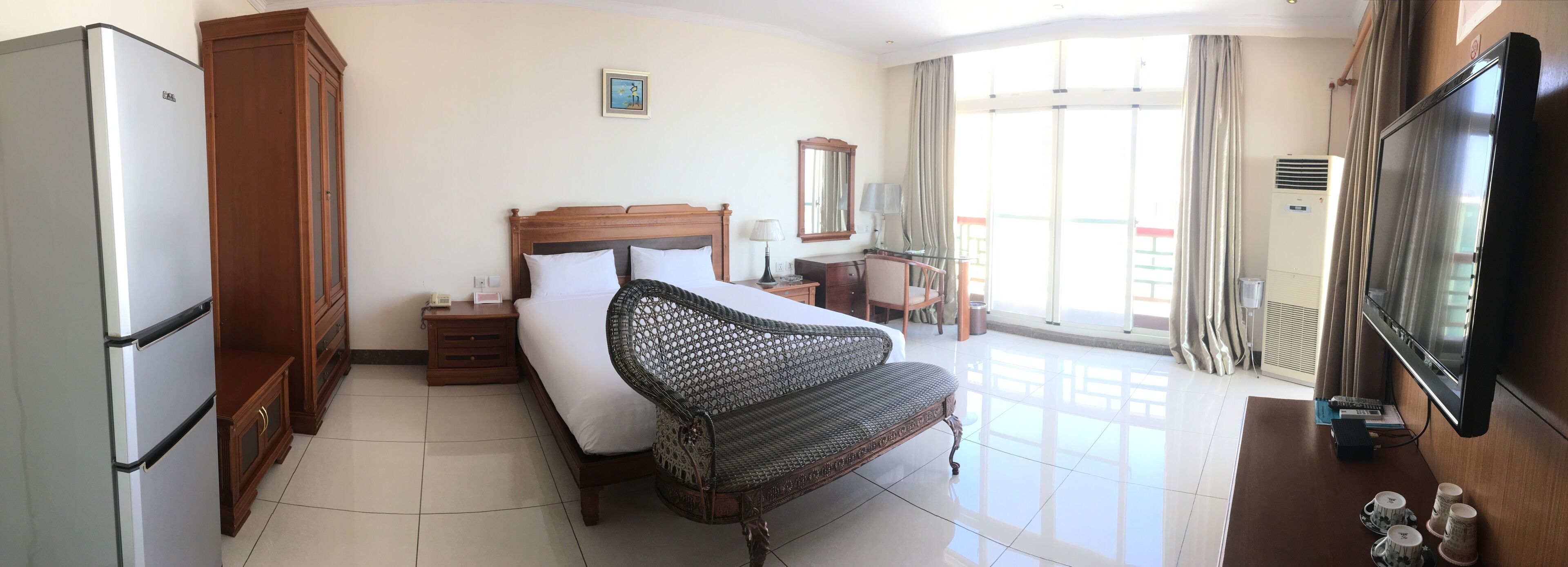 Desk, laptop workspace, free WiFi, bed sheets