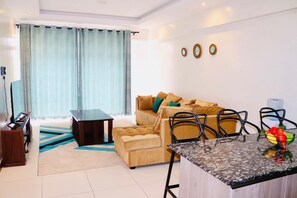 Classic Apartment | Living area | 24-inch Smart TV with digital channels - Lux Suites Silverstone Apartments (Nairobi)