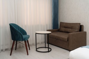 In-room safe, desk, laptop workspace, iron/ironing board - The Tower Hotel Tashkent (Tashkent)