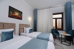 Standard Twin Room | In-room safe, desk, laptop workspace, iron/ironing board