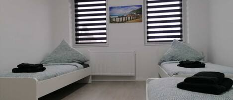 2 habitaciones, wifi gratis y ropa de cama