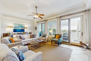 TV - Enchanting & modern waterfront condo just steps to the beach, pools & hot tubs (Panama City Beach)