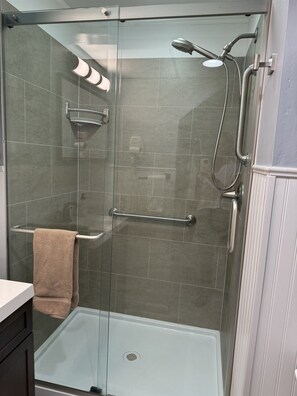 Shower, hair dryer, towels