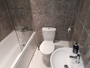 Shower, free toiletries, hair dryer, towels