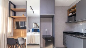 A modern hotel room with a bed, a desk, a kitchenette, and a bathroom. - Vossa Bossa Chez Frei (São Paulo)